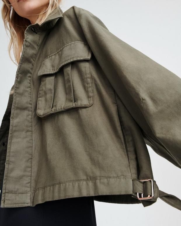 Oversized Khaki Outerwear With Flap Pockets, Oversized Military Outerwear With Pockets, Oversized Military Cotton Utility Jacket, Khaki Shacket With Multiple Pockets For Fall, Fall Khaki Shacket With Multiple Pockets, Oversized Military Spring Outerwear, Oversized Military Outerwear For Spring, Olive Utility Jacket With Cargo Pockets For Fall, Trendy Fall Outerwear With Cargo Pockets