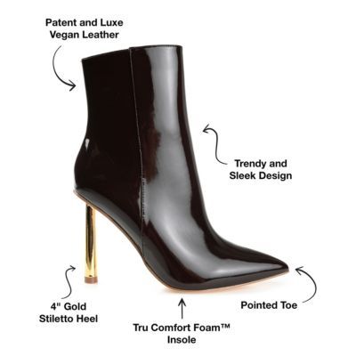 Keep it simple but make a statement with the Rorie bootie by Journee Collection. These booties feature a sky-high stiletto heel and a super stylish pointed toe. Soft vegan leather with an inside zipper makes them easy to pull on, and a 4 mm Tru Comfort Foam footbed makes them a breeze to walk in. | Journee Collection Women's Rorie Booties, 12M