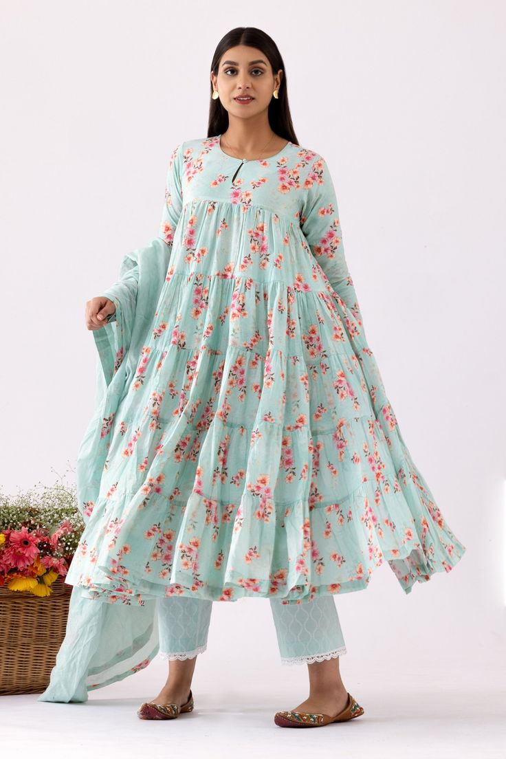 Aqua full sleeve A-line flare anarkali with all over flower block print. Paired with quatrefoil pattern dupatta and pant.
Components: 3
Pattern: Print
Type Of Work: Floral
Neckline: Round Neck
Sleeve Type: Full Sleeves
Fabric: Cotton Cambric
Color: Blue
Other Details: 
Scallop lace trim palazzo
Occasion: Mehendi and Haldi - Aza Fashions Gathered Anarkali, All Over Flower, Quatrefoil Pattern, Scalloped Lace, Full Sleeves, Printed Pants, Set For Women, Three Quarter Sleeves, Anarkali