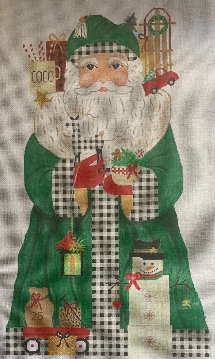 a cross stitch christmas card featuring santa claus