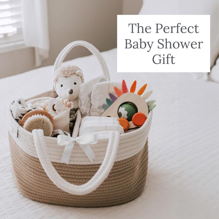 the perfect baby shower gift is in a basket with stuffed animals and toys inside it