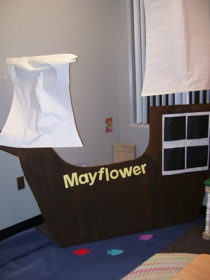 a cardboard boat with the word mayflower on it