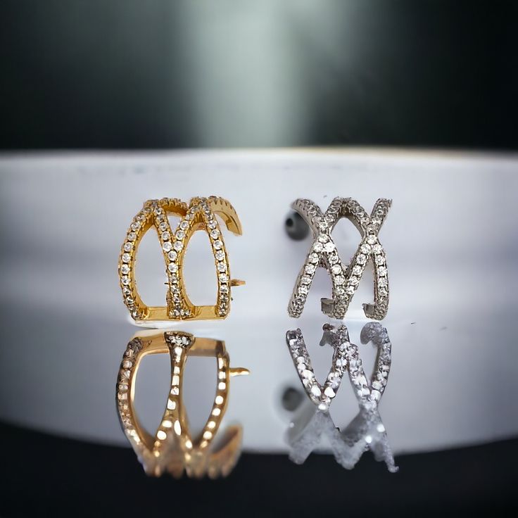 1.Wearing an initial M or W is a classic way to make a statement! Show off your first name, your last name, childrens' name, or even an alma mater with these letter earrings. Initial earrings for women are made to last! 2.The earring has simulated diamonds earrings which is made of cubic zirconia.It is the most popular choice for affordable luxury; 3.Three types apperance views from different viewing angles,one viewing angle is initial letter M,one is initial letter W,and one is crown; Material: Double M, Letter Earrings, Initial Earrings, Sterling Silver Initial, Silver Jewelry Necklace, Earring For Women, Earrings Stud, Initial Letter, Initial Letters