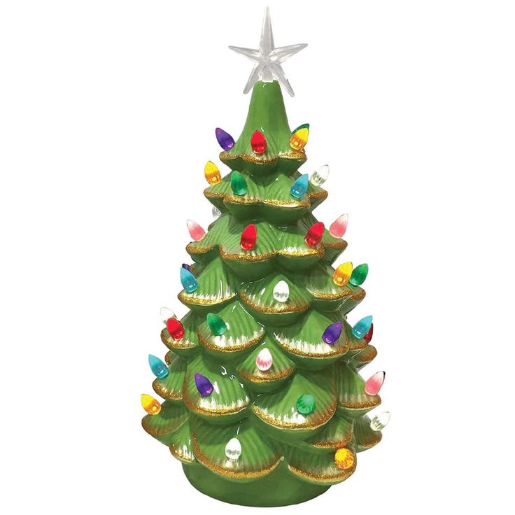 a green ceramic christmas tree with lights on it