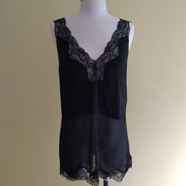 Esley Brand Nwt Black Sheer Lace Detailing Very Pretty Available Sizes: 1-Small Nwt No Packaging 2-Medium Nwt In Packaging 3-Large Nwt In Packaging Sheer Sleeveless Top For Night Out, Chic Sheer Camisole For Daywear, Chic Sleeveless Camisole For Daywear, Black Cami Top For Daywear, Sheer Sleeveless Top For Daywear, Sleeveless Sheer Top For Daywear, Black Spaghetti Strap Tops For Daywear, Chic Sleeveless Camisole With Lace Trim, Sleeveless Tank Top With Lace Trim For Night Out