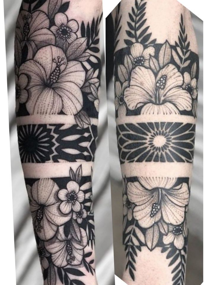 a black and white tattoo with flowers on the arm, leg and forearm tattoos for women