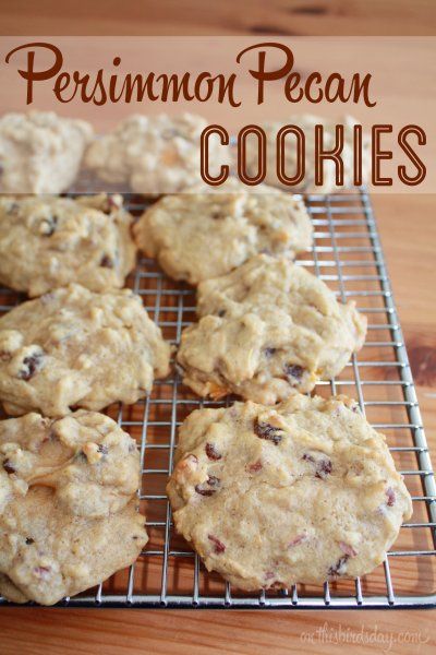 cookies cooling on a wire rack with the words persimmon pecan cookies above it