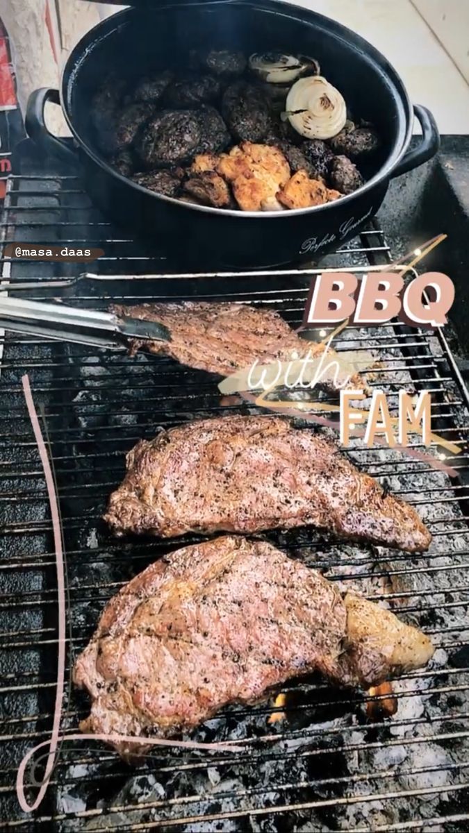 bbq with meat and vegetables cooking on the grill