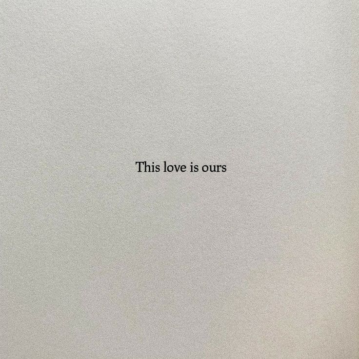 a white wall with the words'this love is ourss'written on it