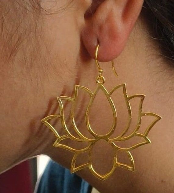 Brass Lotus Flower Dangle Earrings, Lotus Flower Earrings,Yoga Jewelry,14K Flower Drop Earrings,Spiritual Jewelry,Mothers Day Gifts Gemstone -  Na Jewelery Category:- Hoop,Earring Metal:-Brass -- T H E * Q U A L I T Y We buy raw gemstones directly from miners and then get them cut and polished at our workshop , Therefore saving some bucks (additional added fees and markups) avoiding a middle man and making sure of the authenticity of the gems. And we use top quality materials that are water safe Lotus Flower Earrings, Gold Floral Jewelry For Festivals, Brass Flower-shaped Earrings For Gifts, Spiritual Earrings For Festivals Gift, Spiritual Style Earrings For Festivals Gift, Spiritual Festival Earrings Gift, Spiritual Earrings For Festivals And Gifts, Festival Flower Earrings For Pierced Ears, Gold Bohemian Flower Earrings As Gift