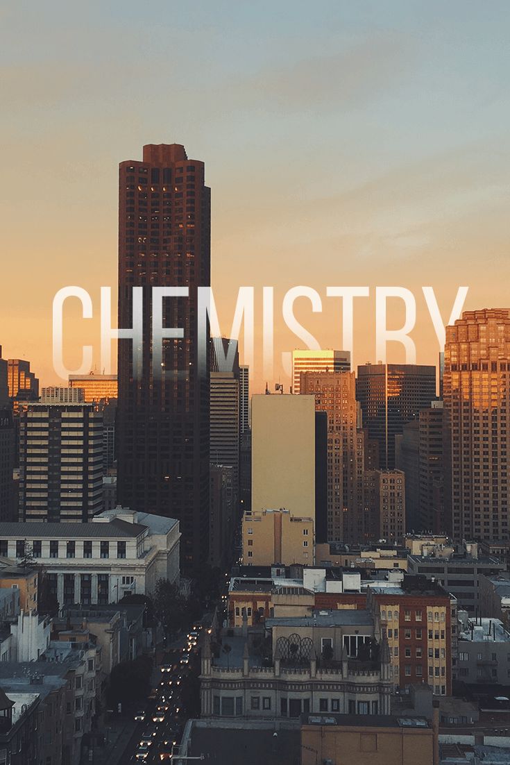 the words chemstry are in front of a cityscape with skyscrapers