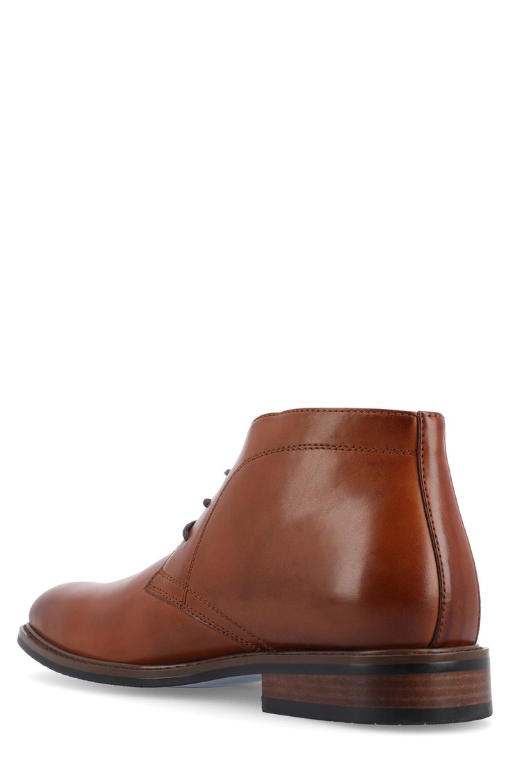 Elevate your work-to-weekend look in this refined faux-leather chukka boot featuring tonal stitch construction, breathable lining and a Tru Comfort Foam insole. Synthetic upper/textile lining/rubber sole Imported Business Chukka Boots For Fall With Plain Toe, Brown Moc Toe Lace-up Boots For Business, Brown Chukka Boots For Formal Occasions In Fall, Plain Toe Chukka Boots For Business Casual In Fall, Fall Brown Chukka Boots For Formal Occasions, Business Casual Chukka Boots With Plain Toe For Fall, Fall Season Brown Chukka Boots For Formal Occasions, Fall Business Casual Chukka Boots With Plain Toe, Plain Toe Leather Lined Work Boots