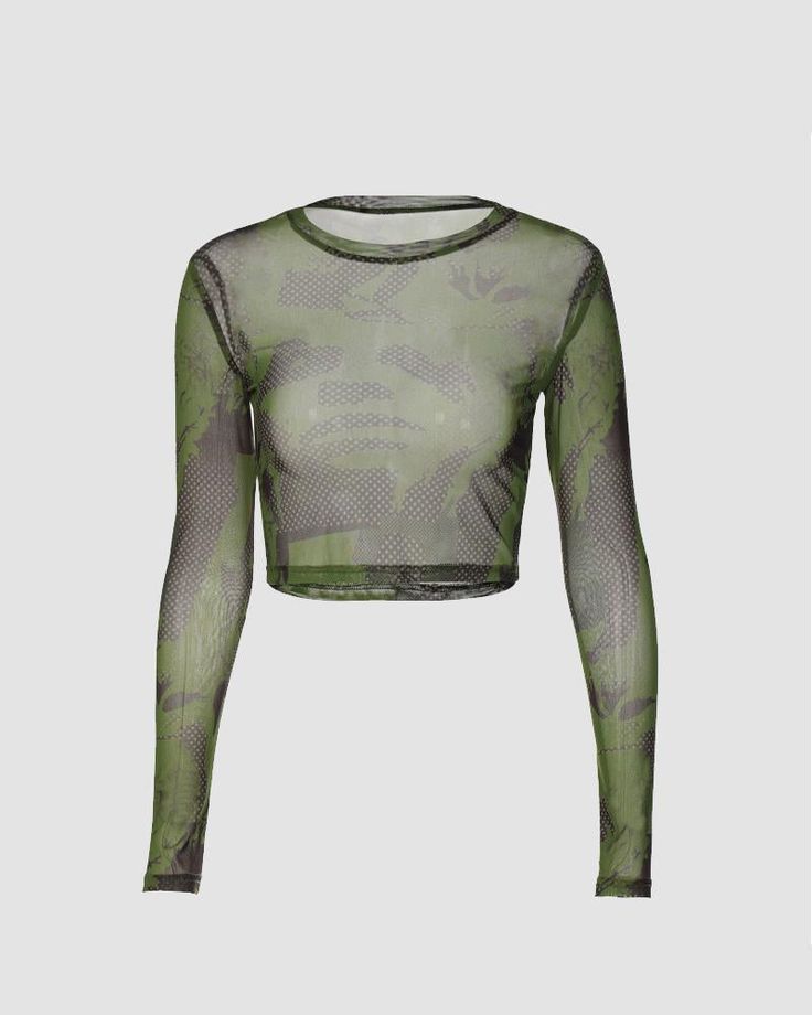 Details: Mesh material long sleeve top with letter and abstract printsTop Length: CroppedSleeve Length: Long sleevesMaterials: 95% Polyester + 5% Spandex Green Fitted Mesh Top With Crew Neck, Stretch Green Printed Top, Trendy Green Long Sleeve Mesh Top, Stretch Long Sleeve Printed Tops, Trendy Tops With Long Mesh Sleeves, Green Long Sleeve Mesh Top, Trendy Long Sleeve Tops With Mesh Sleeves, Spring Long Sleeve Mesh Top With Graphic Print, Trendy Green Top With All Over Print