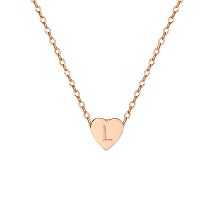 The charming Heart Initial Necklace features a heart-shaped pendant, capturing the essence of your love. Wear it to embrace a personal connection and showcase your affection in a stylish and meaningful way. Mother's Day Heart Necklace With Adjustable Initial Pendant, Adjustable Initial Pendant Necklace For Valentine's Day, Valentine's Day Necklace With Initial Pendant, Minimalist Adjustable Heart Charm Necklaces, Rose Gold Heart Necklace With Delicate Chain, Everyday Rose Gold Heart Pendant Necklace, Heart Charm Initial Pendant Necklace Gift For Her, Everyday Initial Heart Pendant Necklace For Mother's Day, Personalized Pendant Heart Necklace With Adjustable Fit