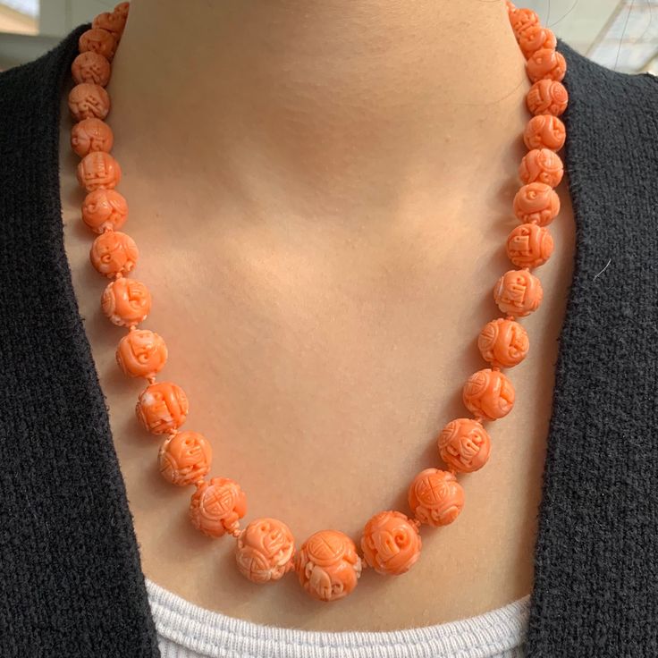 "Clasp: 16 mm x 8 mm  Metal: 14K Gold  Length: 21.0\" Primary Stone Type: Coral Primary Stone Shape: Carved Round Bead Primary Stone Dimensions: 5.00 mm - 14.25 mm  Weight: 71 gram" Formal Carved Round Necklace, Formal Round Carved Necklace, Elegant Carved Round Necklace, Elegant Round Carved Necklaces, Elegant Carved Necklaces, Elegant Orange Jewelry With 8mm Beads, Traditional Carved Necklaces For Formal Occasions, Elegant Carved Orange Jewelry, Elegant Orange Carved Jewelry