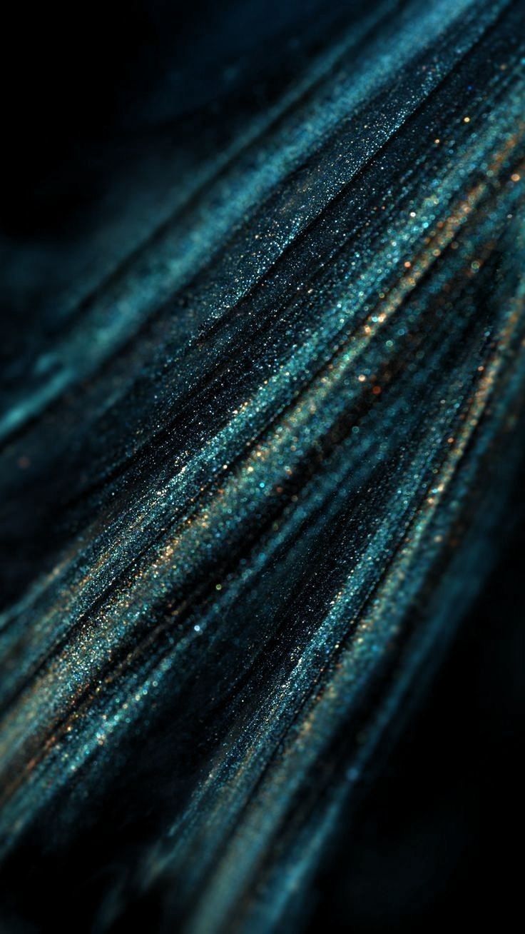 blue and gold glitter fabric with black background