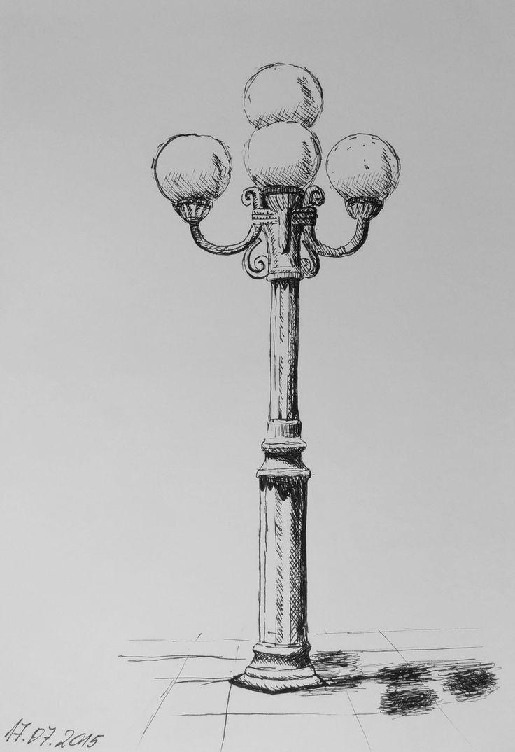 a drawing of a street light with three balls on it's top and bottom