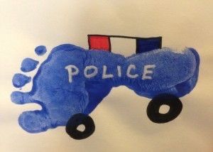 a blue handprint with the word police painted on it