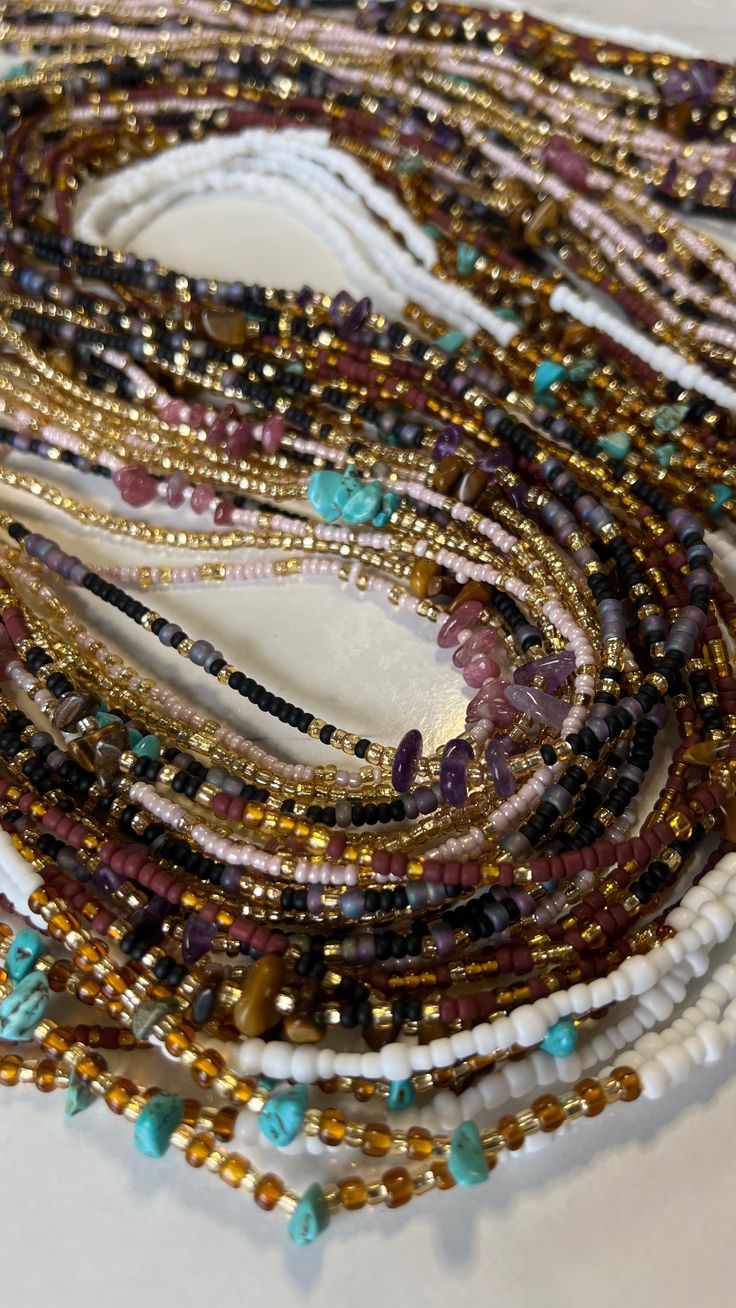 I'm pleased to offer my handmade waist beads to you at wholesale pricing. With these strands, you will be able to make at minimum 2x profit off of your initial investment( depending on your markup). All waist beads will be traditional tie-ons on a standard 50-inch string. These waist beads will be seed beads and accent beads. As well as an option for crystal waist beads. There are 3 design options to choose from 1. Intuitive design- Leave it to me and I'll intuitively create all the waist bead s