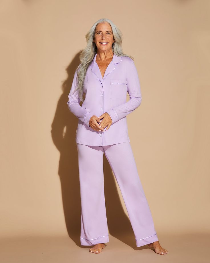 Comfy Bella Relaxed Fit Long Sleeve Top& Pants set in Pima Cotton and Modal for sleepwear and loungewear. Super soft and durable Peruvian Pima cotton and modal with flat, satin piping in tonal shades. Relaxed, roomier, comfort fit. Long sleeve, button down, relaxed, looser fit shirt with patch pocket. Wide leg long pants with drawstring waist. Cold water wash and hang to dry. Do not dry in dryer. Soft Solid Color Sleepwear, Cotton Sleepwear With Soft Touch For Loungewear, Soft Cotton Sleepwear For Loungewear, Soft Sleepwear Long Pants For Relaxation, Solid Color Sleepwear Long Pants For Loungewear, Solid Color Long Pants Sleepwear For Loungewear, Solid Color Relaxed Fit Pant Set For Loungewear, Relaxed Fit Lounge Pant Set, Spring Lavender Loungewear Pants