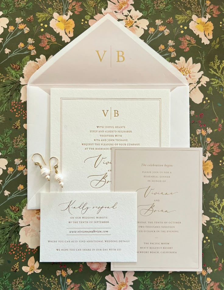 an elegant wedding suite with floral wallpaper