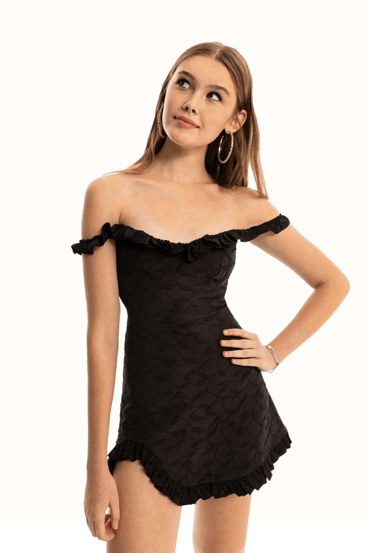 The Wild Rose dress with low sleeve detail was designed for NAIA girls who wanted to look stylish and pretentious in one piece.Fabric Contents: 97% Cotton 3% LYCStyle Suggestion: Sneakers Off-shoulder Dresses With Ruffle Hem For Night Out, Off-shoulder Ruffle Dress For Date Night, Black Off-shoulder Dress With Ruffles, Black Off-shoulder Ruffled Dresses, Black Off-shoulder Ruffle Dress, Flirty Short Sleeve Formal Dress, Party Ruffle Dress With Short Sleeves, Short Sleeve Ruffle Dress For Party, Fitted Ruffle Dress With Short Sleeves For Evening