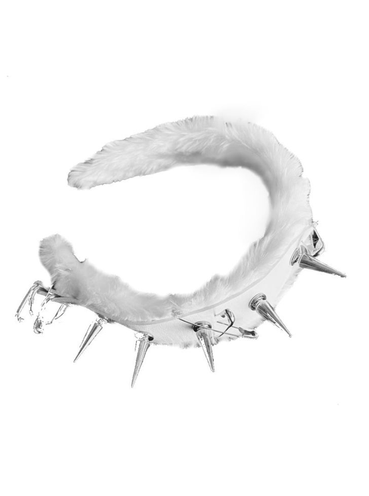 a white furry collar with spikes on it