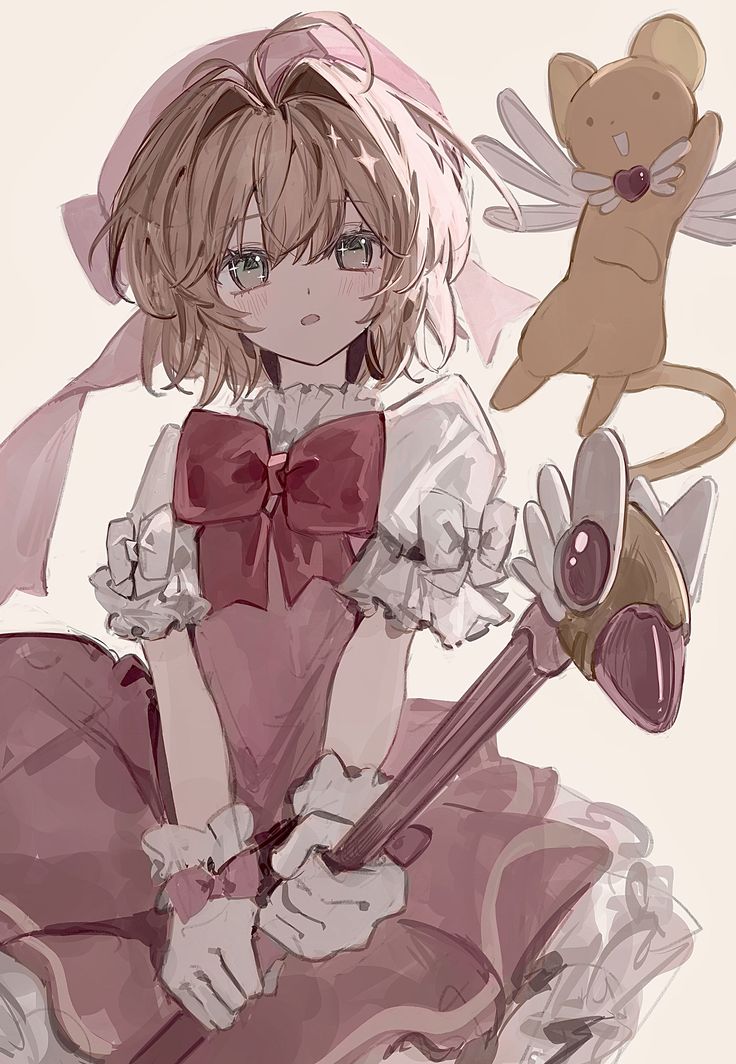 a girl in a pink dress holding a brown teddy bear and wearing a red bow