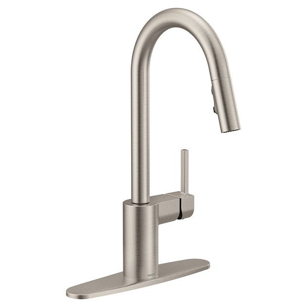 a stainless steel sink faucet with an angled spout and side sprayer