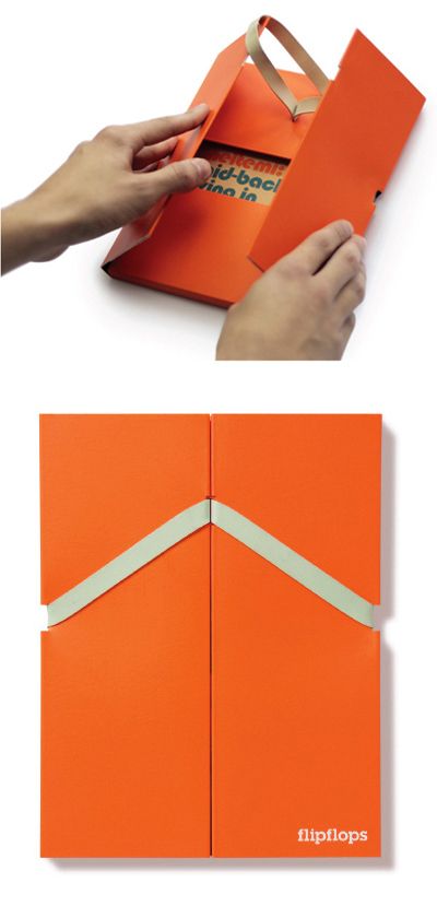 an orange book opened to show the inside pages and fold it into a rectangle shape