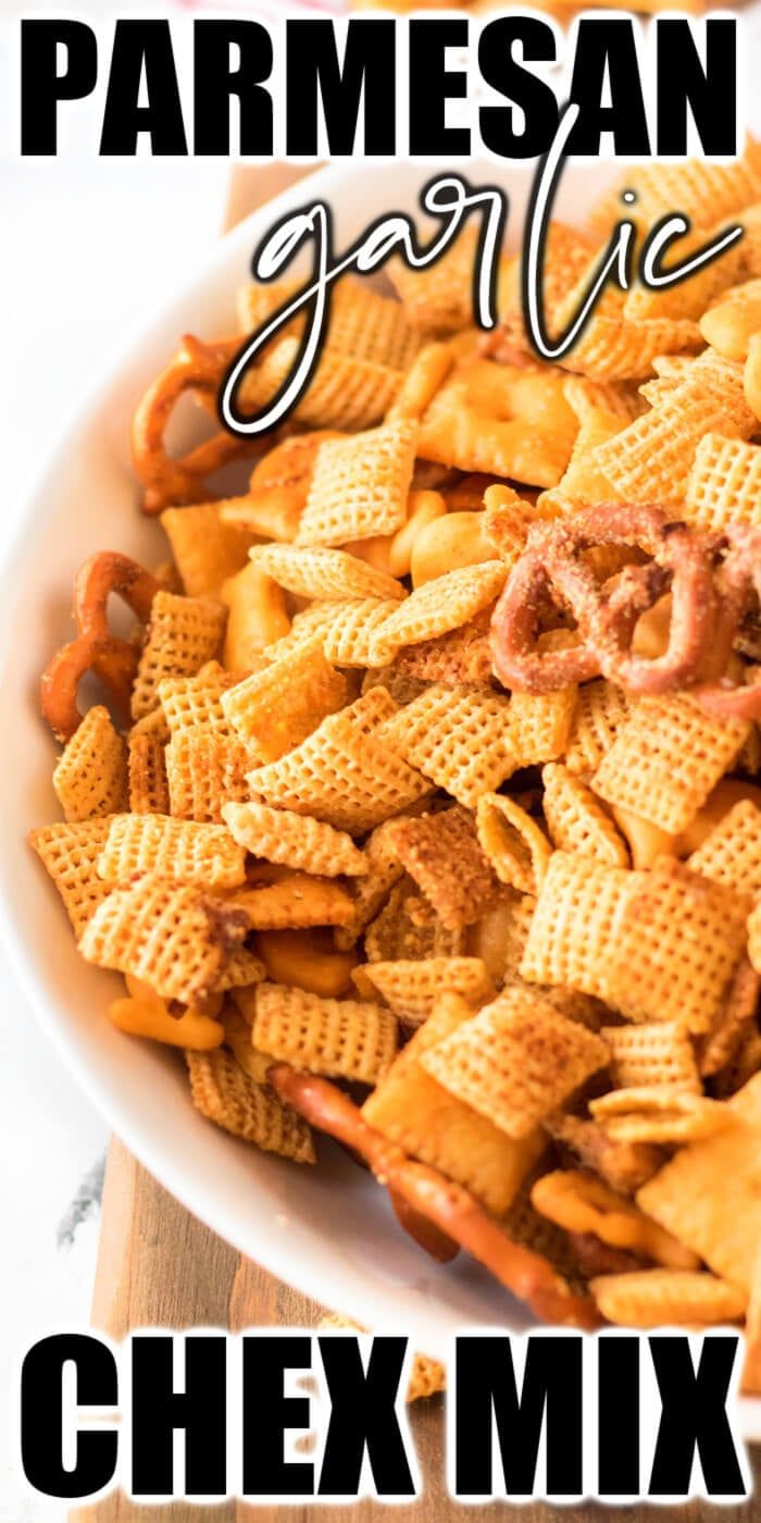 a bowl full of chex mix with the words parmesan garlic on it