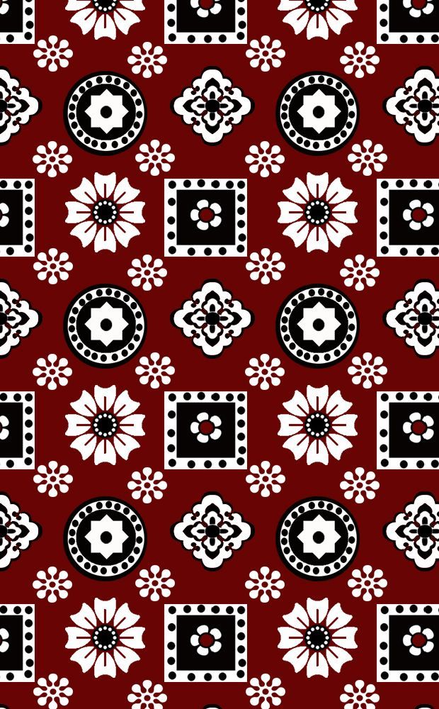 a red and black pattern with white flowers