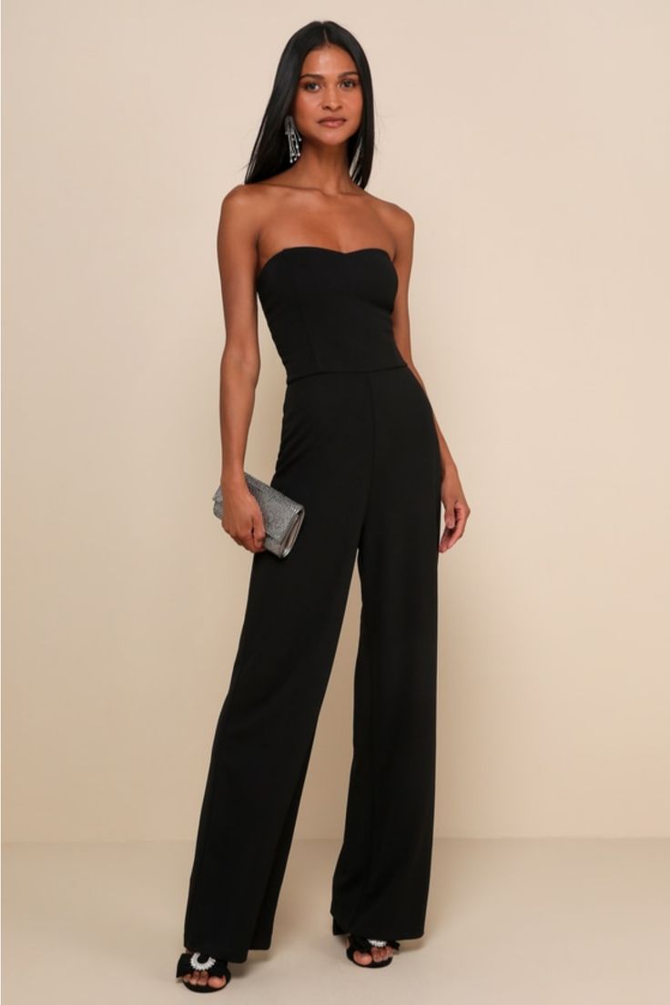 From cocktail hours to refind affairsâ€”No matter the occasion, the Lulus Edith Black Strapless Wide-Leg Jumpsuit is sure to impress! Stretchy ponte knit shapes a strapless, princess-seamed bodice with an elasticized back for fit. A high, fitted waist tops wide pant legs that fall to full-length hems. Hidden back zipper/clasp. Fit: This garment fits true to size. Length: Floor length. Size medium measures 53.75" from top to bottom. Inseam: 32.00 Front Rise: 13.25 Bust: Works best for A to C cup sizes - consider sizing up for fuller bust. Waist: Fitted - stretchy fabric allows custom fit. Hip: Fitted - stretchy fabric allows room for hips. Undergarments: May be worn with a strapless bra, adhesive bra, petals, or no bra. Fabric: Fabric is very stretchy. Fully lined. Shell: 95% Polyester, 5% Fitted Strapless Jumpsuit For Summer Gala, Glamorous Fitted Strapless Jumpsuit For Gala, Glamorous Fitted Strapless Jumpsuit For Date Night, Elegant Strapless Jumpsuit With Sweetheart Neckline For Party, Elegant Strapless Jumpsuits And Rompers For Gala, Fitted Summer Jumpsuits And Rompers For Gala, Elegant Strapless Jumpsuit For Gala, Fitted Jumpsuits And Rompers For Gala In Summer, Fitted Jumpsuits And Rompers For Summer Gala