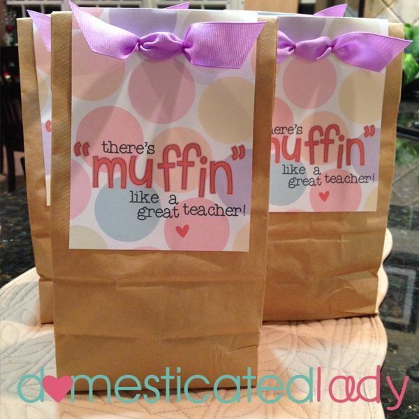 there are two brown bags with pink bows on them that say, there's muffin like a great teacher