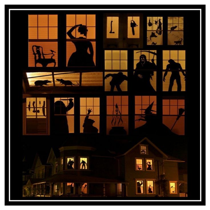 the silhouettes of people standing in front of windows at night