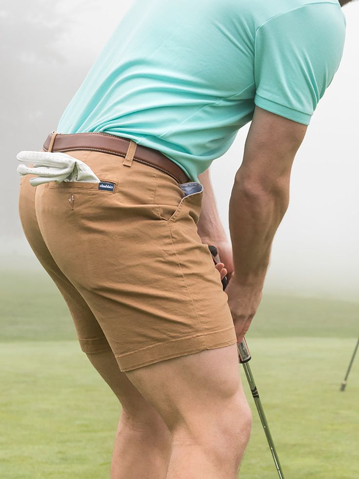 Built for those classy moments where you gotta dress your casual shorts up. Made with our classic Originals spandex stretch fabric in a classier, more tailed fit, the Flat Front shorts are designed to give you that elevated chino look without sacrificing comfort. They rock a non-elastic waistband and oxford lined pockets, so whether you're headed to the golf course or a casual lunch meeting, you can feel confident that all of your necessities are safe and secure. Fabric: 98% cotton / 2% spandex Casual Fitted Golf Shorts, Golf Bottoms With Built-in Shorts And 4-way Stretch, Cotton Golf Bottoms With Built-in Shorts, Cotton Bottoms With Built-in Shorts For Golf, Stretch Golf Shorts, Stretch Golf Bottoms Short Length, Classic Stretch Shorts With Pockets, Golf Bottoms With Built-in Shorts In Cotton, Classic Bottoms With Built-in Shorts And 5-inch Inseam