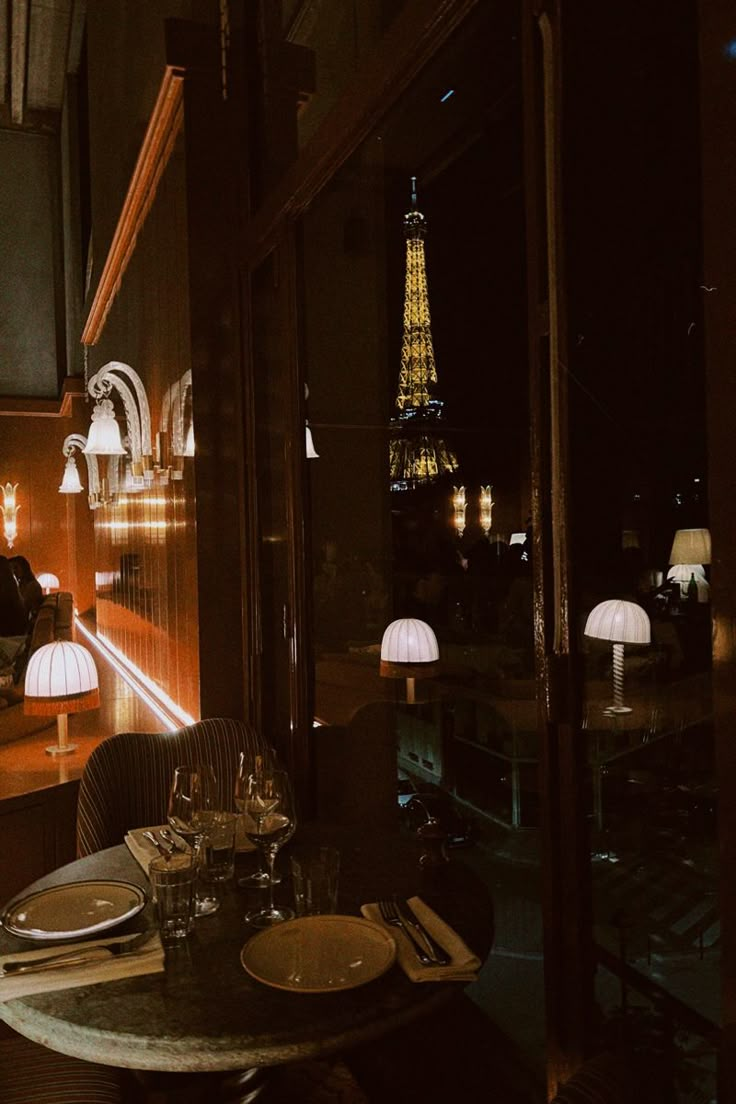 a restaurant with the eiffel tower in the background