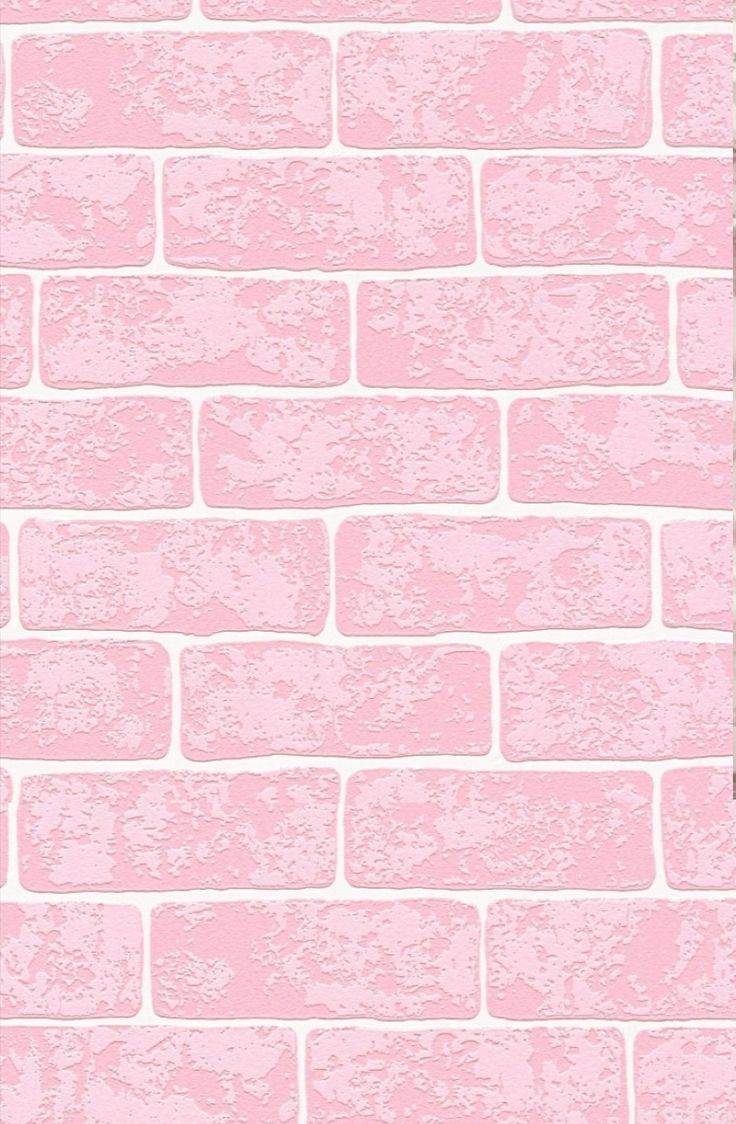 a pink brick wall with white grungy paint on the top and bottom half