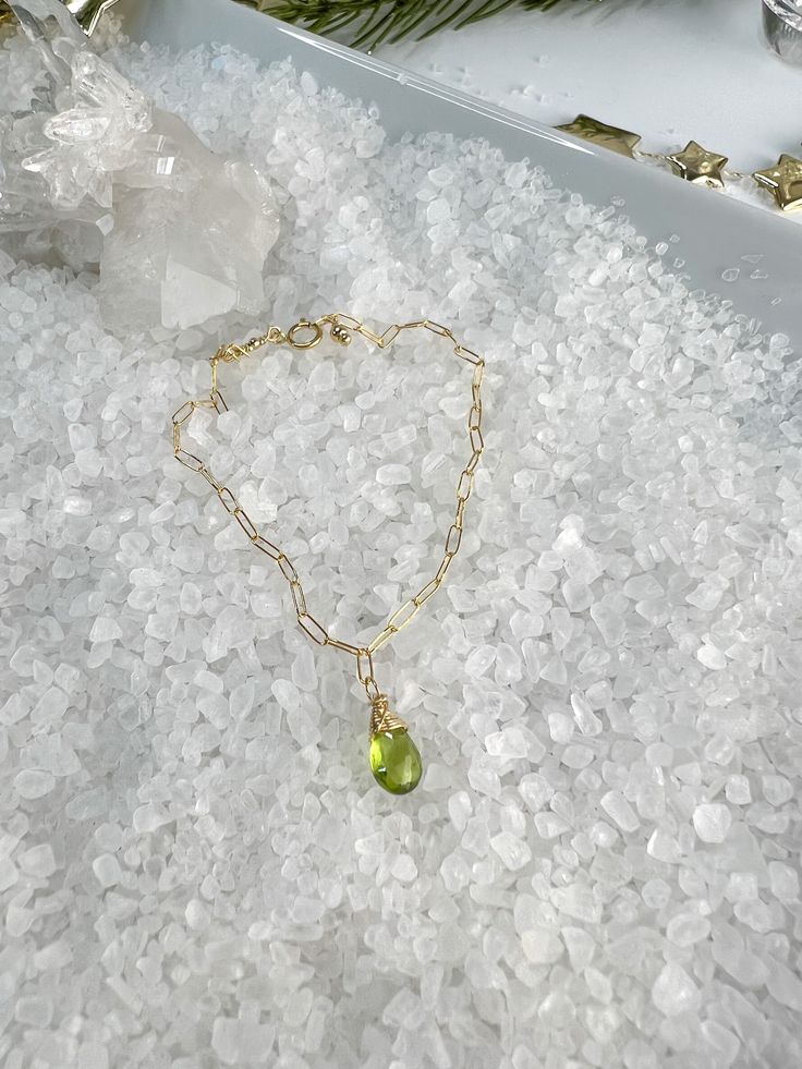 🌴 VACATION ALERT 🌴 I will be on vacation from 8/8-8/23. If you place an order after 8/5, it WILL NOT SHIP UNTIL 8/25.Beautiful faceted Peridot Briolettes are hand wrapped in the pretty matching set.Necklace measures 18".Bracelet measure 7" & can be shortened on any of the links.Earrings dangle from gold filled ear wires & include silicon ear backs.Beautiful set for those August Birthdays, lovers of Green, or St. Patrick's Day! August Birthdays, August Birthday, Peridot Necklace, Earring Gift, Set Necklace, Hand Wrap, Earrings Dangle, The Pretty, Necklace Bracelet