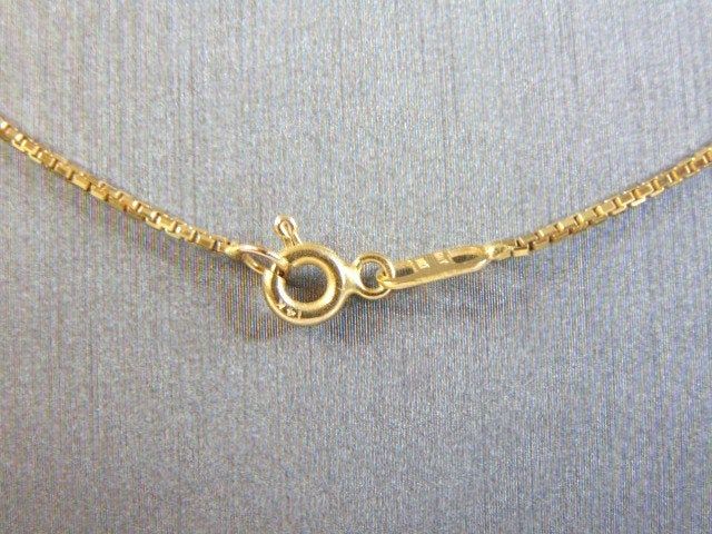 "FOR SALE IS THIS VINTAGE 14K YELLOW GOLD FINE BOX LINK NECKLACE WITH A GOLD HEART PENDANT. THE TOTAL WEIGHT IS 6.4g. THE NECKLACE MEASURES 20\" LONG FROM THE CLASP. THE HEART PENDANT MEASURES 1 1/4\" LONG BY 7/8\" WIDE. MAKES A GREAT GIFT FOR THAT SPECIAL SOMEONE. ANY QUESTIONS, PLEASE ASK. BE SURE TO CHECK OUT SOME OF OUR OTHER GREAT ITEMS. THANK YOU." Formal Gold Necklaces With Hallmarks, Gold Heart Pendant Necklace With Hallmarks, Antique Yellow Gold Necklaces With Hallmark, Antique Yellow Gold Heart Necklace, Vintage Gold Necklace With Hallmarks, Antique Heart-shaped 14k Gold Necklace, Antique Heart Pendant In Yellow Gold, Yellow Gold Heart-shaped Necklace With Hallmark, Valentine's Day Yellow Gold Heart-cut Necklace