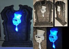 three different pictures of the same statue with blue light coming from it's mouth