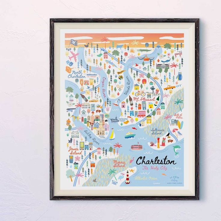 a framed map of charleston, with the city's streets and major landmarks in pastel colors