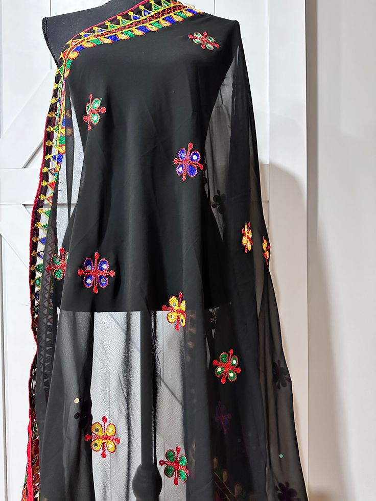 This black Navaratri dupatta features delicate thread work and glimmering mirrors, adding an elegant touch to any outfit. Made from georgette fabric, it is lightweight and comfortable to wear during festive occasions. Enhance your style and make a statement with this beautiful dupatta. Navaratri Dupatta, Beautiful Dupatta, Short Kurtis, Dhoti Pants, Georgette Fabric, End Of Season Sale, Thread Work, New Instagram, Festival Wear