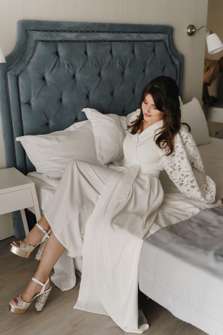 Step into your special day with the grace of a princess 👑, even before you put on your wedding gown. Our exquisite collection of bridal boudoir robes and nightgowns is designed to make every bride feel cherished and one-of-a-kind 💖. From joyful moments with your bridal party to quiet, reflective minutes before the mirror, our luxurious pieces add a touch of elegance and comfort to these precious moments. ✨ Elegance and Comfort Each robe and nightgown is crafted from the finest fabrics, includi Elegant Lace Gown For Wedding Night, Feminine Wedding Maxi Dress With Lace Sleeves, Elegant Gown With Lace Bodice For Wedding Night, Elegant Lace Bridal Gown, Elegant Bridal Lace Gown, Feminine Maxi Dress For Wedding Night, Elegant Dresses With Lace Sleeves For Wedding Night, Elegant Wedding Night Dress With Lace Sleeves, Feminine Wedding Gown With Lace Trim