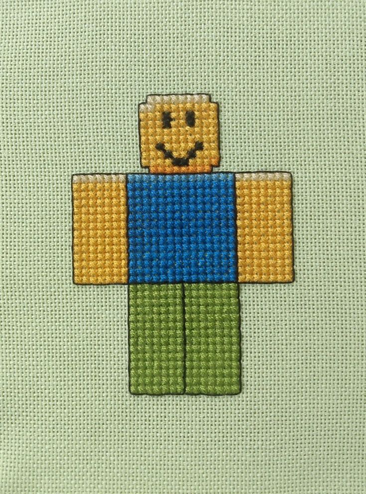 Cross stitch of a noob from Roblox. Roblox Cross Stitch, Roblox Perler Beads, Roblox Crochet, Roblox Pixel Art, Cross Stitch Games, Pink Cross Stitch, Gamer Art, Roblox Party, Roblox Character