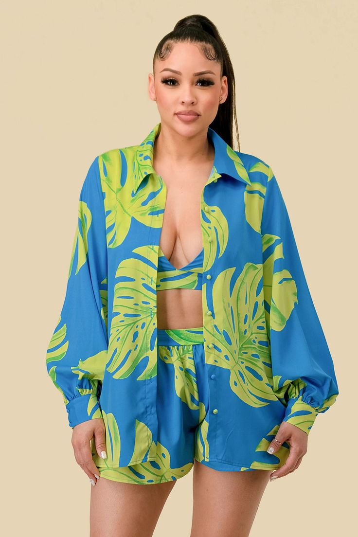 Vacay me now in our Summer Tropic Palm 3 piece short set. Long billow sleeved bloused with matching bralet and shorts. "Summer Tropic Palm 3PC Short Set” Chiffon long maxi length button up shirt Elastic waist Long sleeve Extended cuff Polyester Imported Cheap Tropical Print Beachwear Tops, Affordable Blue Tropical Print Shirt, Affordable Blue Tropical Bottoms, Luxury Summer Tops For Beach, Affordable Color Block Summer Sets, Two Piece Pant Set Beach, Luxury Beachwear Shorts With Built-in Shorts, Luxury Striped Sets For Spring, Luxury Summer Beach Shirt