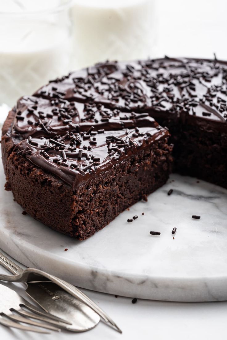 a chocolate cake with one slice cut out