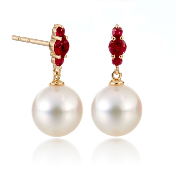 Hovering over a luminous white Akoya pearl, rubies shimmer like the three bright stars of Orion's Belt, rendering these earrings simply out of this world. Since 1861, Gump's has been a destination for jewelry that is distinctive and timeless. To ensure each piece is created to our exacting standards, our expert in-house jewelry team oversees every step of the production process. The result is a statement of pure elegance. White Akoya cultured pearls, 8.5mm. Rubies, 0.30ctw. 14-karat yellow gold. Elegant White Ruby Earrings, White Ruby Round Earrings, Orion Earrings, Ruby And Pearl, Orion's Belt, Pure Elegance, Signature Jewelry, Akoya Pearls, Personalized Monogram