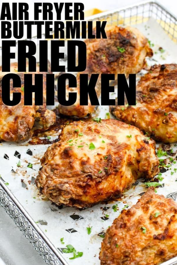 some fried chicken in a metal pan with the words air fryer buttermilk fried chicken