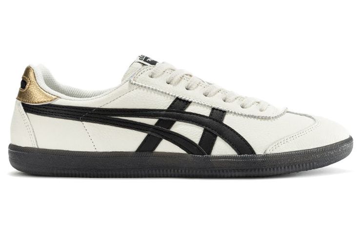 The Onitsuka Tiger Tokuten Shoes in the ‘White Black Gold’ colorway blend timeless style with modern flair. Crafted from sturdy leather, these sneakers feature a clean design in white, black, and cream white. The iconic Tiger stripes adorn the sides, while the reliable gum rubber sole ensures optimal grip. Whether you’re hitting the streets or adding a sporty touch to your outfit, these Tokuten shoes deliver comfort and versatility. A fusion of Japanese craftsmanship and contemporary fashion, th Onitsuka Tiger Tokuten Women Outfit, Onitsuka Tiger Black And White, Onitsuka Tokuten Outfit, Tokuten Onitsuka, Onitsuka Tiger Tokuten, Shoes Rotation, Onitsuka Tiger Shoes, Onitsuka Tiger Women, Onitsuka Tiger Mens